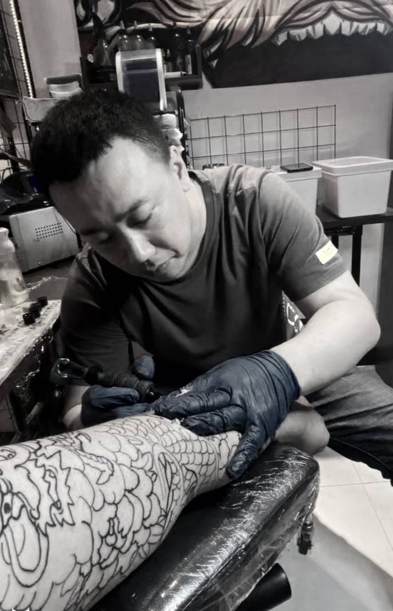 龙七分袖纹身图片_新传统纹身图案