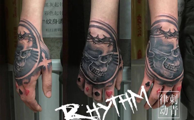 骷髅纹身图片_成品手部欧美写实人物宗教原创纹身图案
