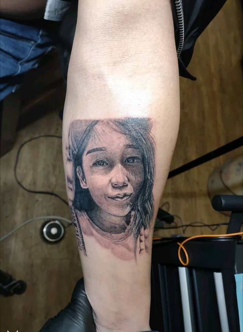 照片纹身图片_手臂纹身图案