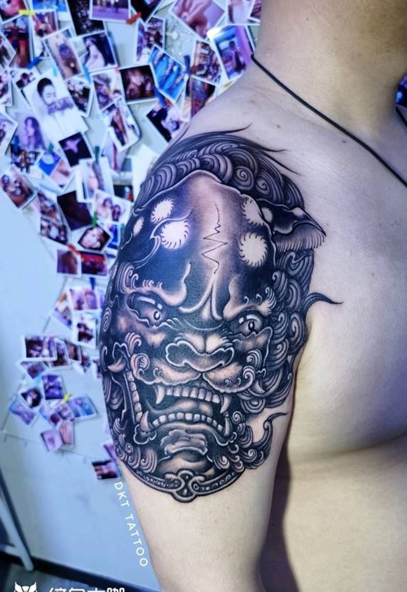 大臂唐狮遮盖作品纹身图片_手臂新传统遮盖纹身图案