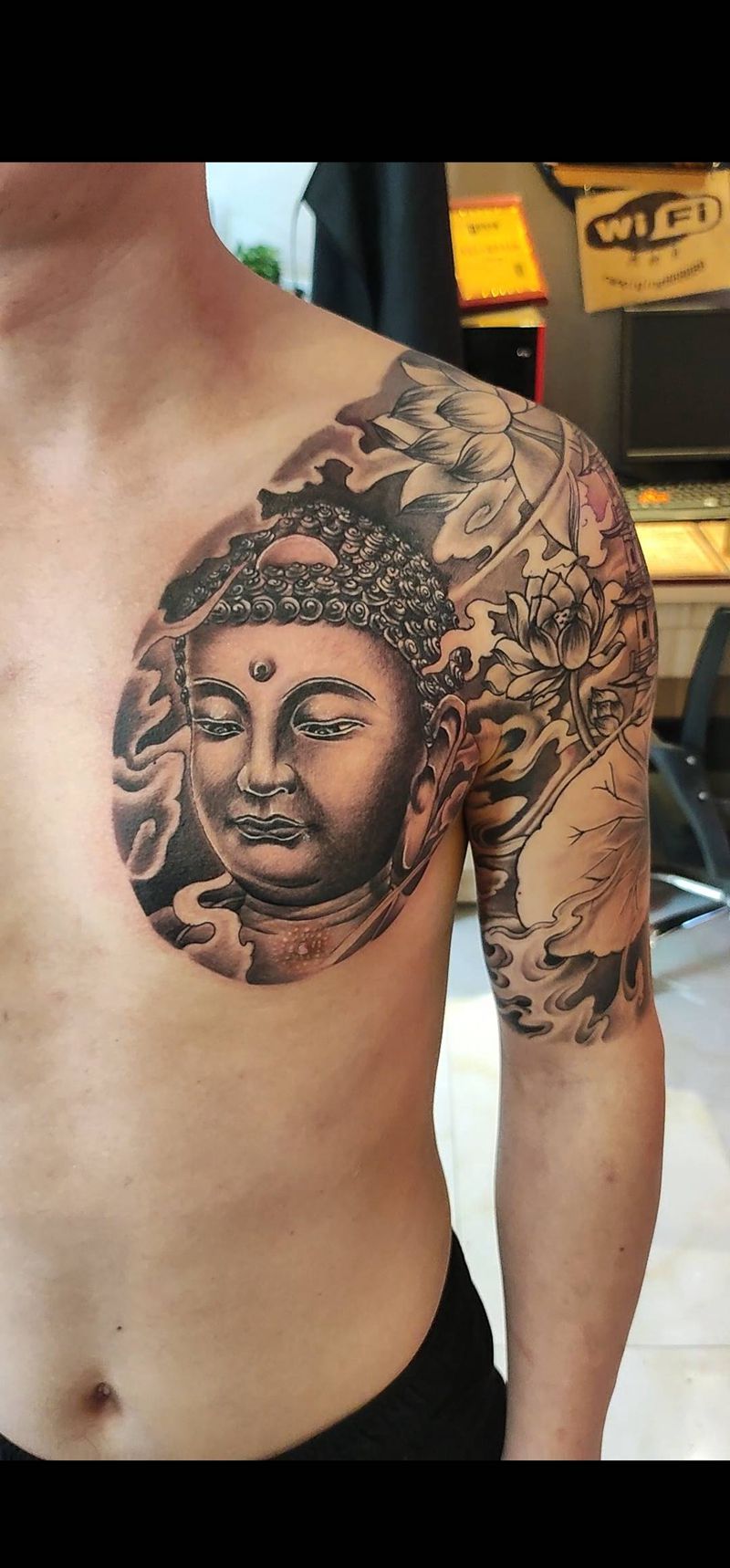 佛像半胛纹身图片_新传统纹身图案