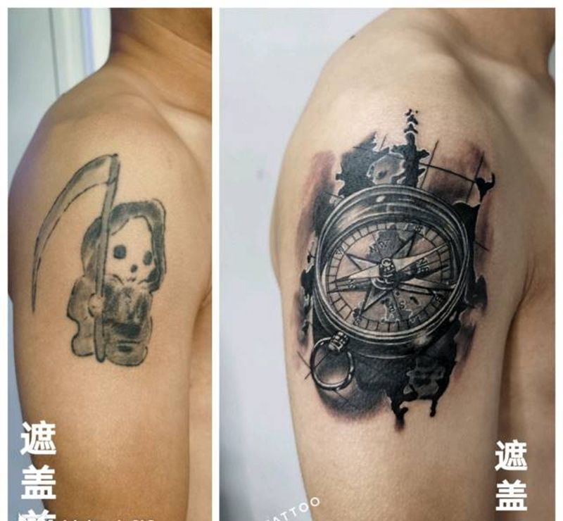 指南针遮盖作品纹身图片_手臂欧美写实遮盖纹身图案