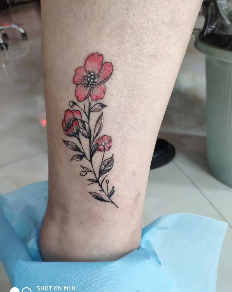 素花纹身图片_腿部纹身图案