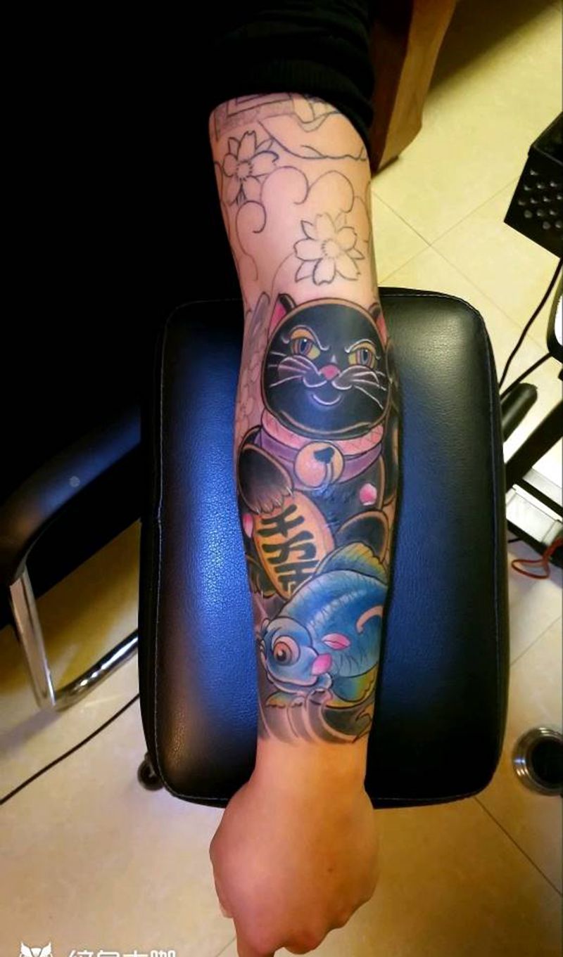 花臂未完纹身图片_手臂新传统纹身图案