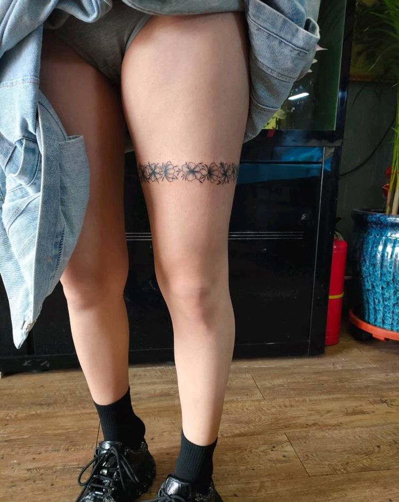 素花腿环纹身图片_腿部纹身图案