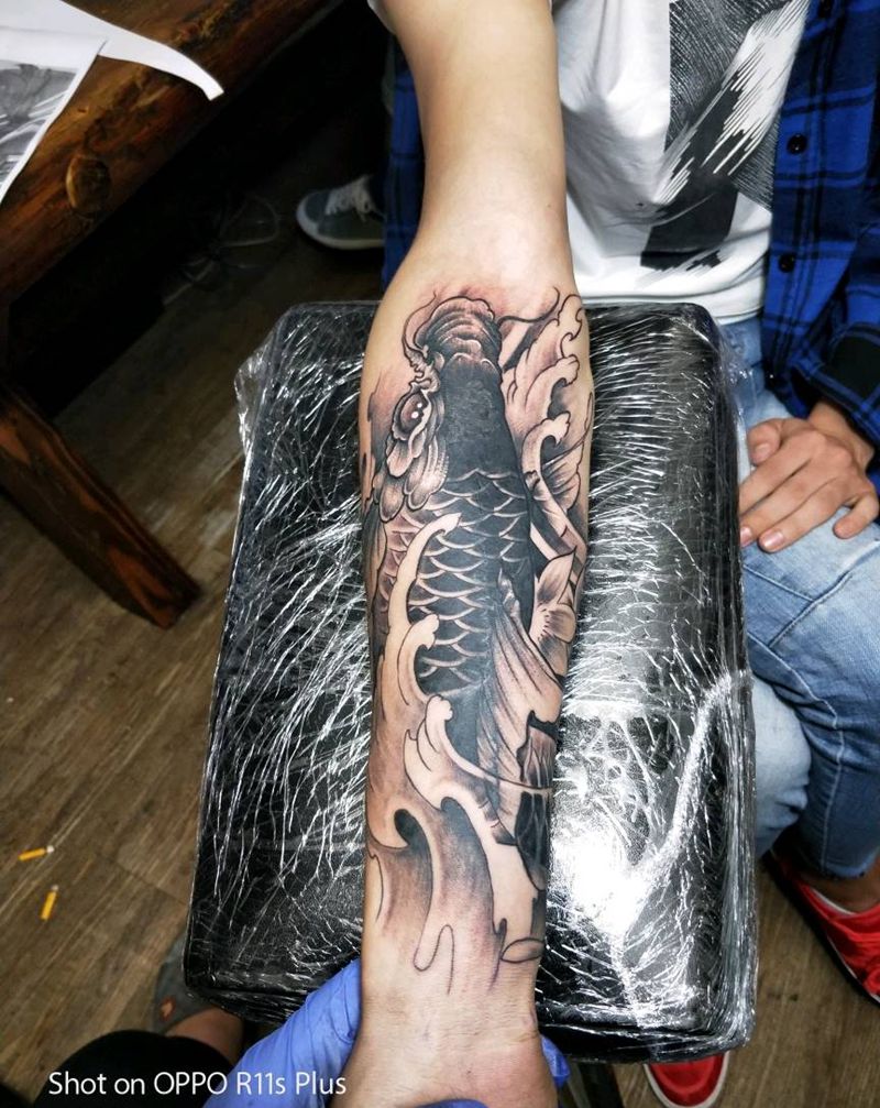 鲤鱼遮盖纹身图片