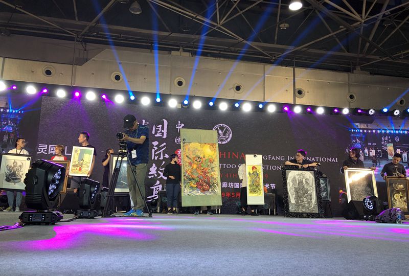 廊坊国际艺术节手稿第一名纹身图片_背部新传统纹身图案