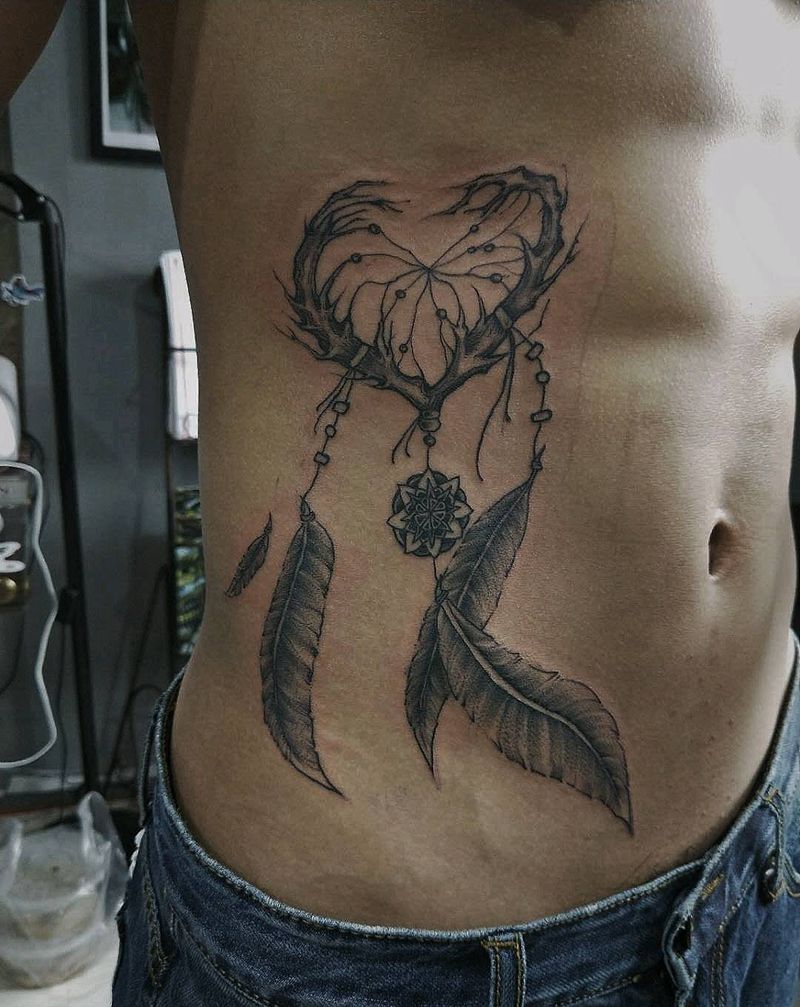 另类捕梦网纹身图片