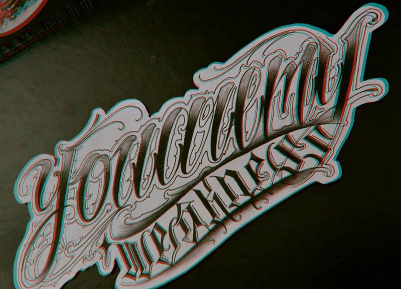 圆叁花体字纹身图片