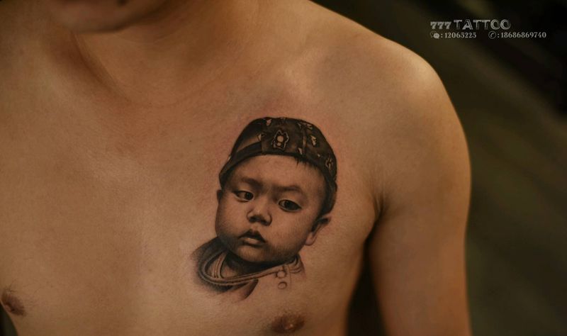 儿子的肖像纹身图片