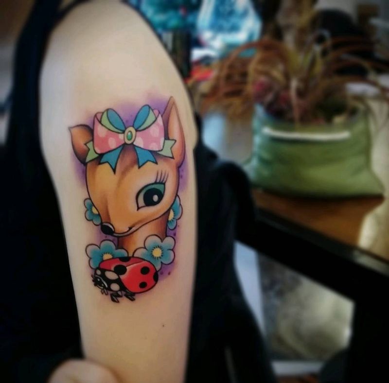 辣妈的小可爱纹身图片_手臂动物成品纹身图案