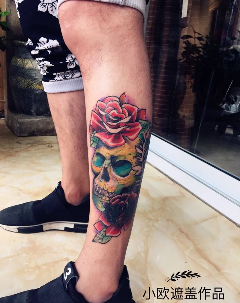 骷髅遮盖旧图腾纹身图片