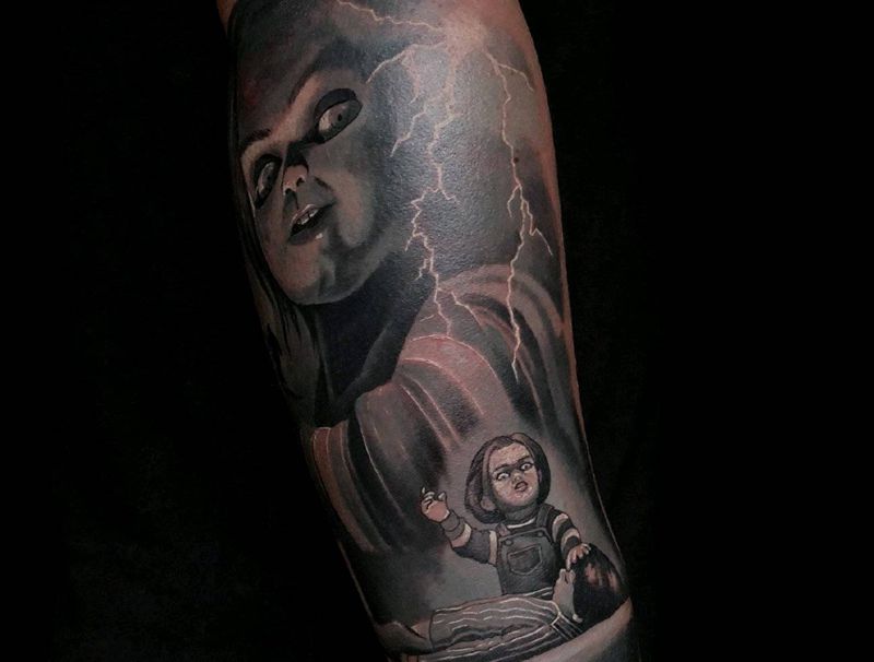 恐怖娃娃纹身图片_手臂欧美写实纹身图案