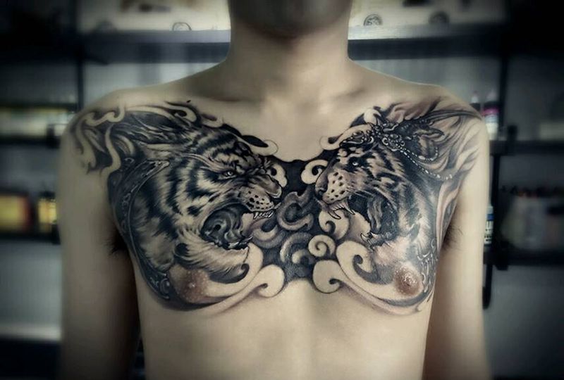 双虎头花胸纹身图片_胸部传统动物花胸成品纹身图案