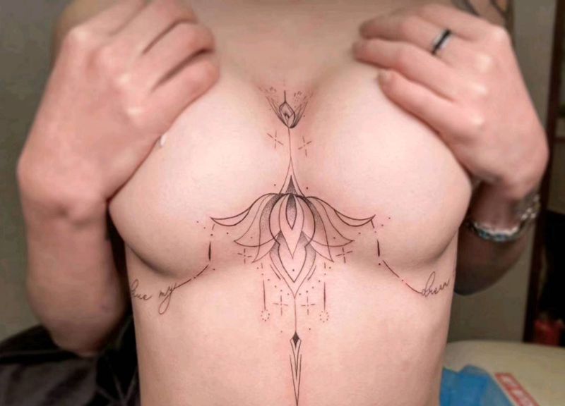 梵花纹身图片_胸部点刺线条素花小清新纹身图案