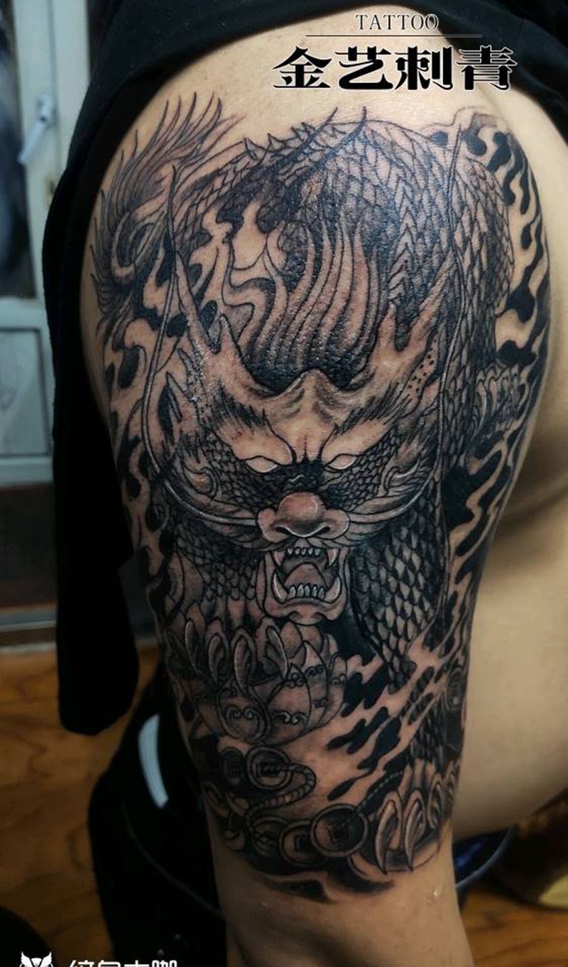 顾客自带图。麒麟纹身图片_手臂纹身图案