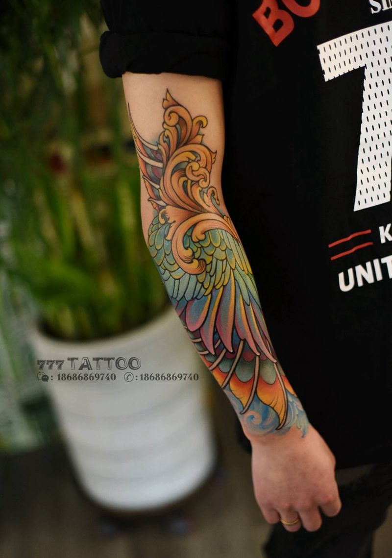 翅膀纹身图片_手臂新传统New School翅膀小臂彩色纹身图案