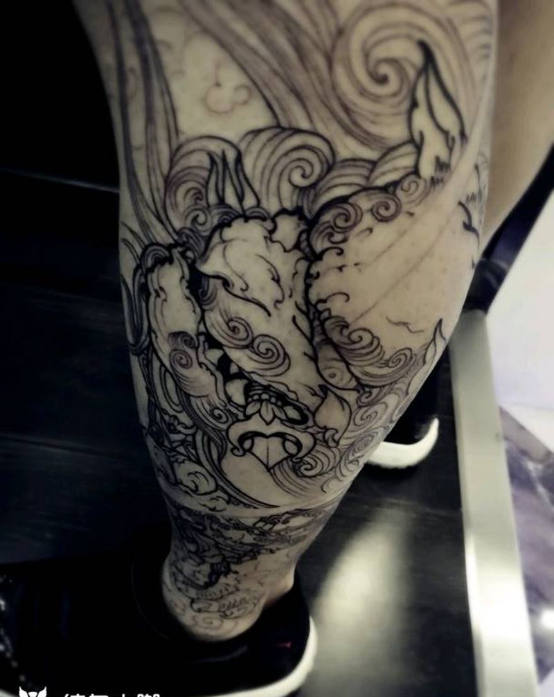 未完小腿外侧唐狮子纹身图片
