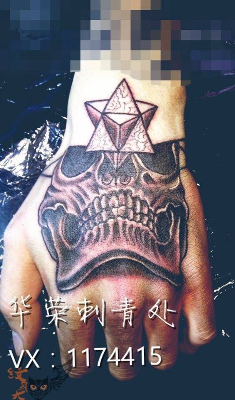 骷髅一枚纹身图片_成品手部欧美鬼神原创纹身图案