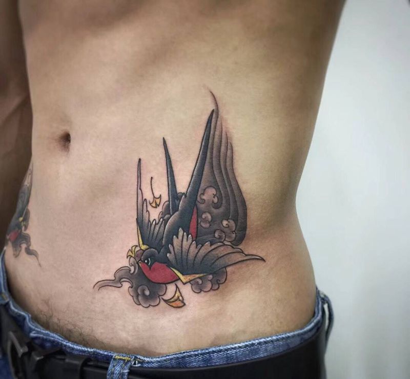 双飞燕纹身图片_成品腰部传统原创线条翅膀纹身图案