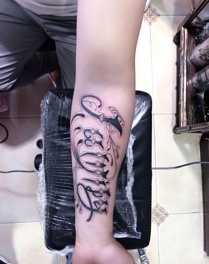 花体字纹身图片_手臂花体字纹身图案