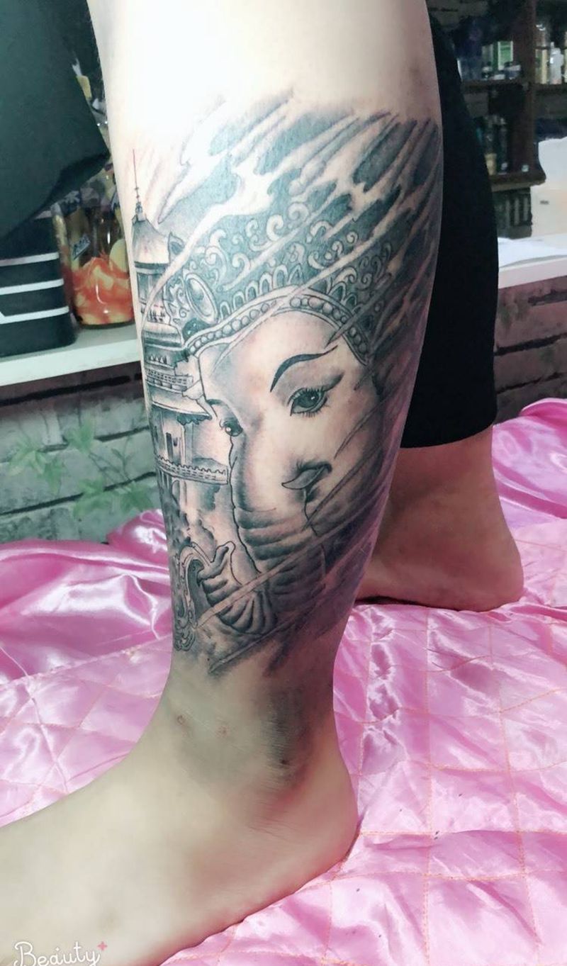 小腿象神纹身图片