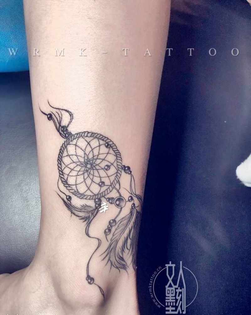 捕梦网/狗爪印纹身图片