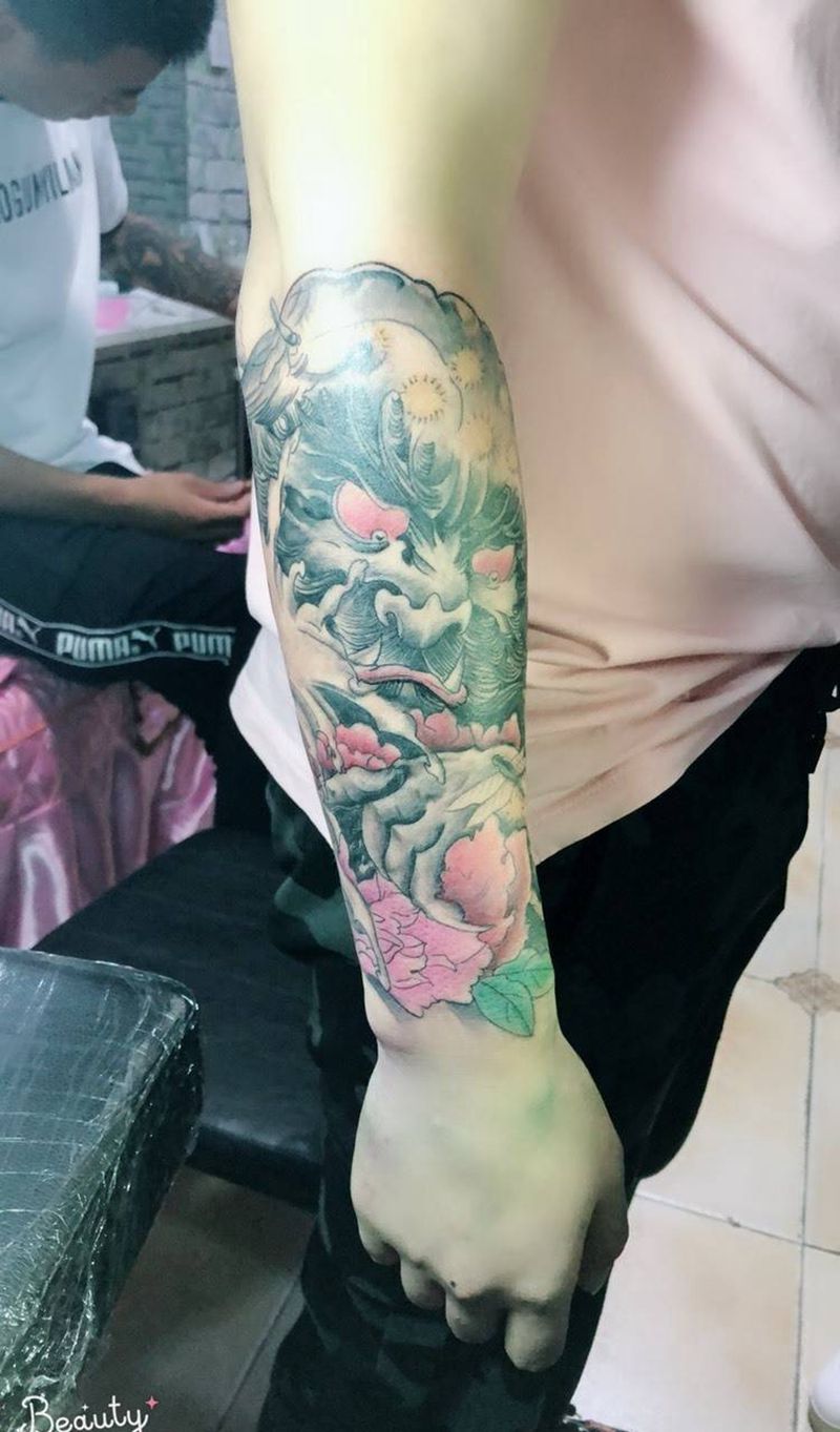 小臂唐狮纹身图片