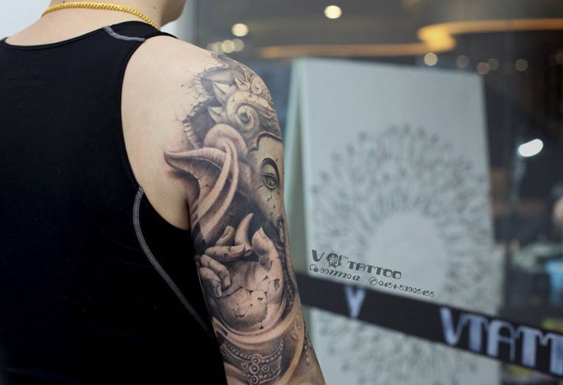 平静阅世！纹身图片_成品手臂阿V作品象神纹身图案