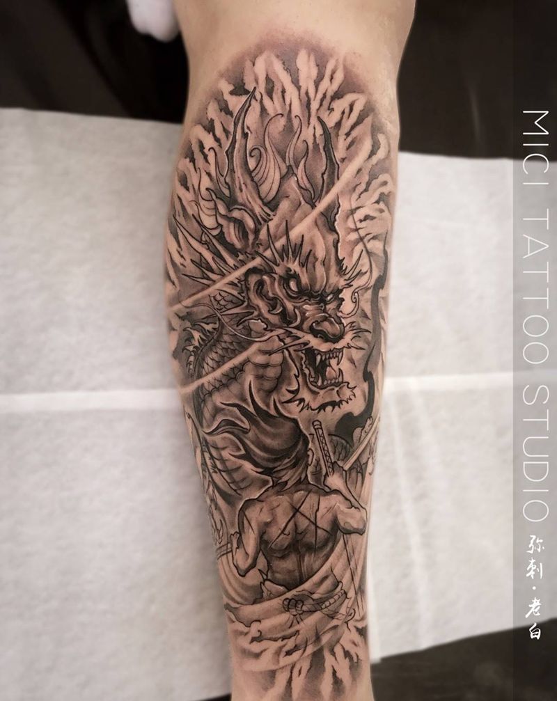 勇者斗恶龙？纹身图片_恶龙勇者龙武士腿部传统纹身图案