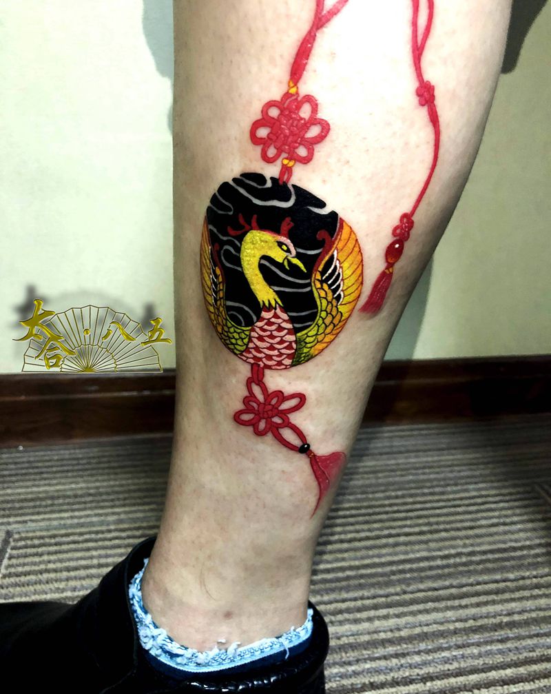 凤凰佩纹身图片_脚部老传统纹身图案