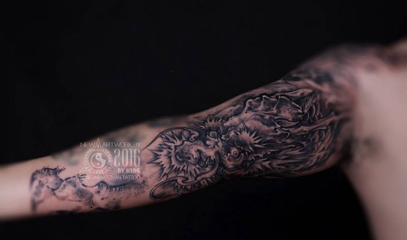 龙纹刻战刺青出品纹身图片_成品手臂传统纹身图案