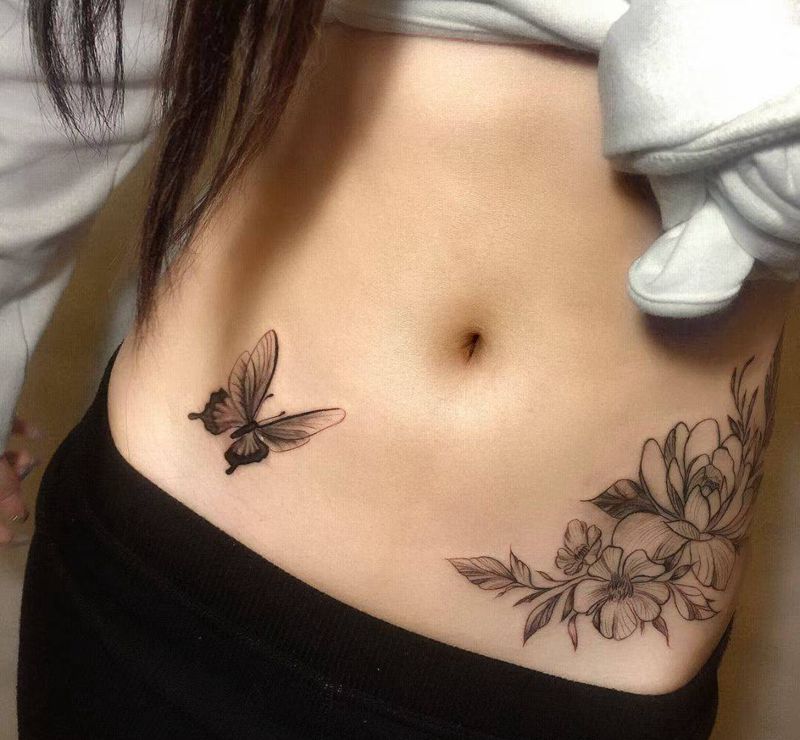 遮盖疤痕纹身图片_腹部纹身图案