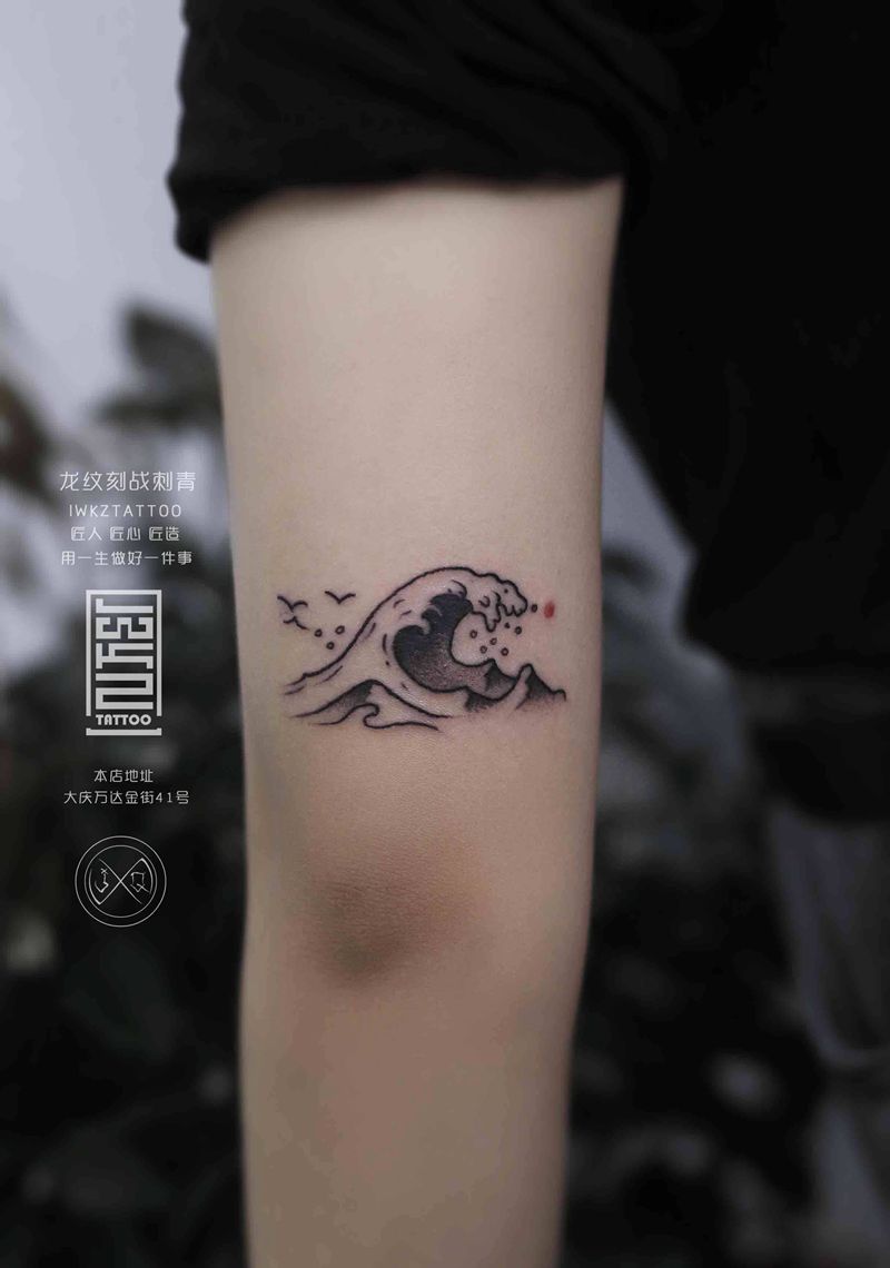 龙纹刻战纹身图片_手臂纹身图案