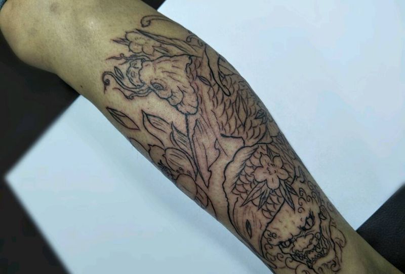 小腿鲤鱼加唐狮。纹身图片