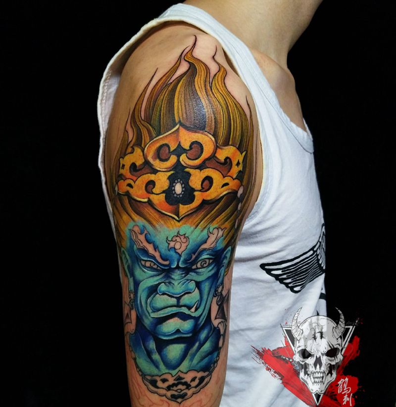重彩不动明王纹身图片_手臂肩部新传统纹身图案