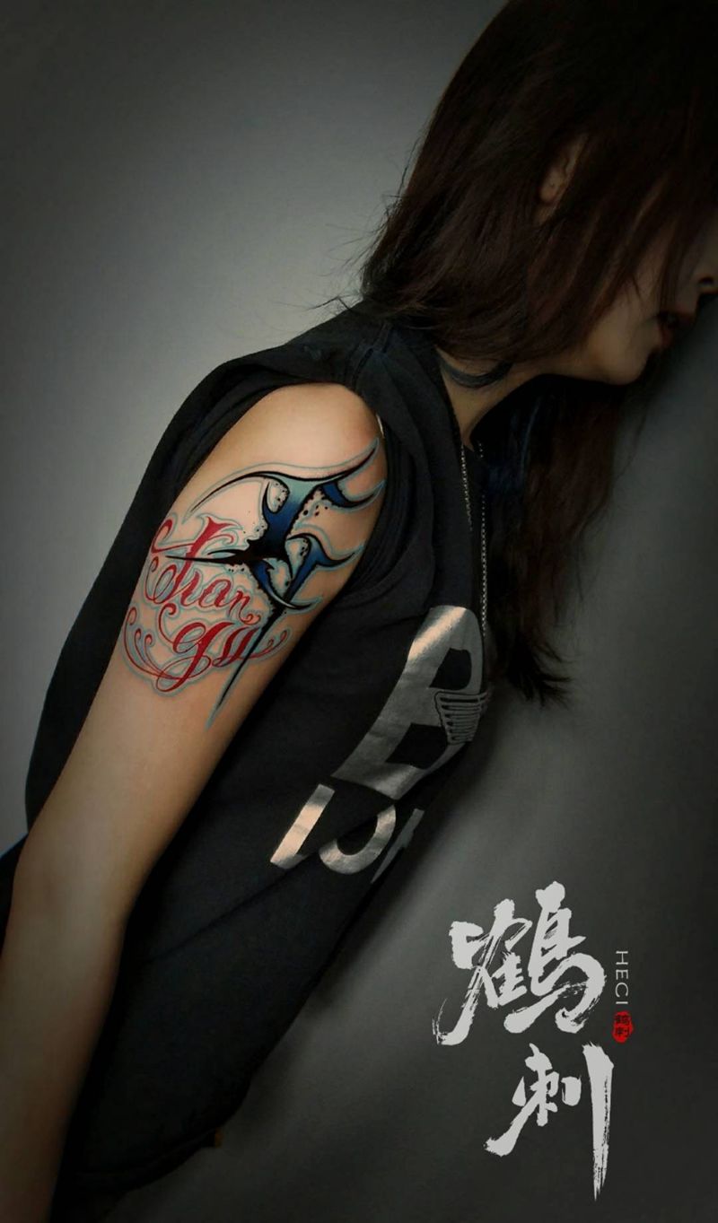 花体纹身图片_手臂花体字纹身图案