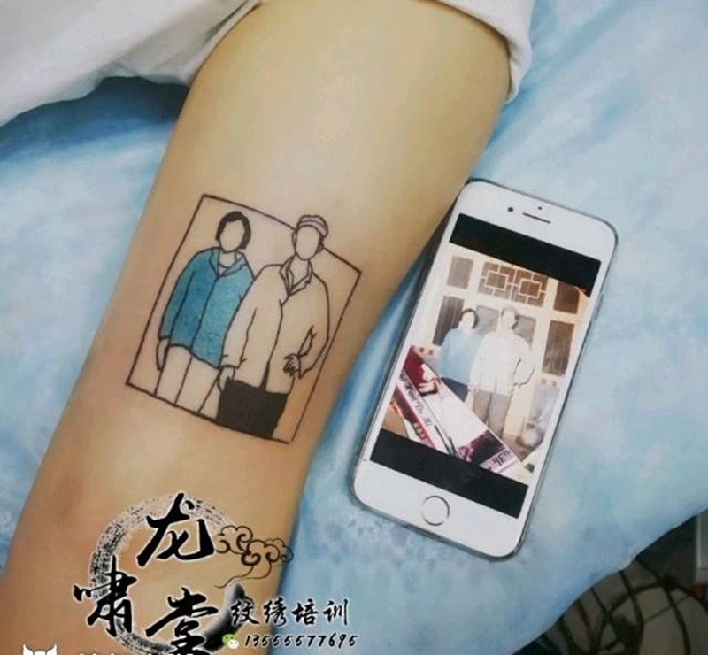 照片纹身图片_手臂纹身图案