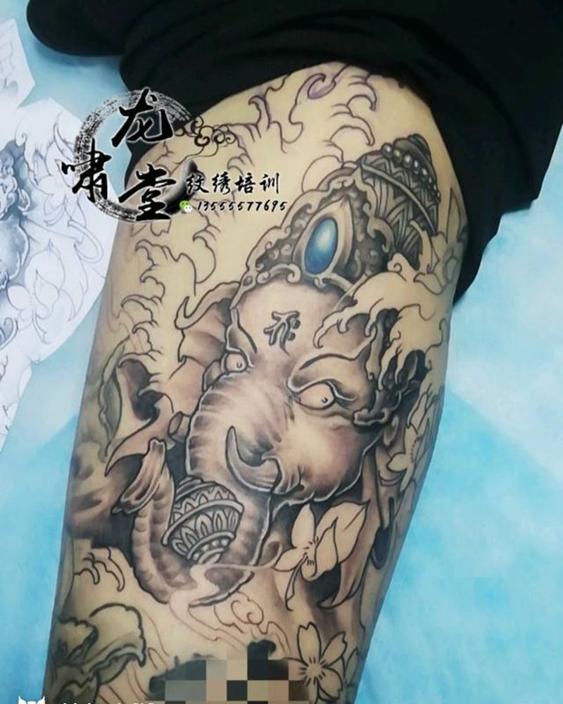 象财神纹身图片_腿部纹身图案