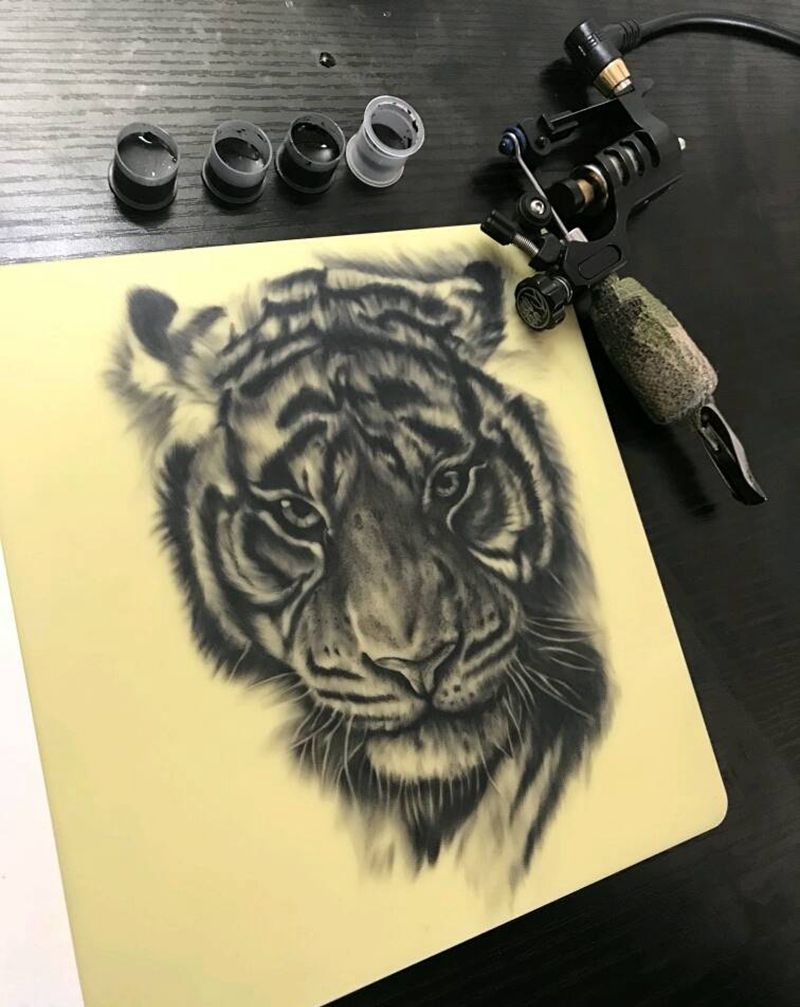 写实小脑斧纹身图片_欧美动物纹身图案