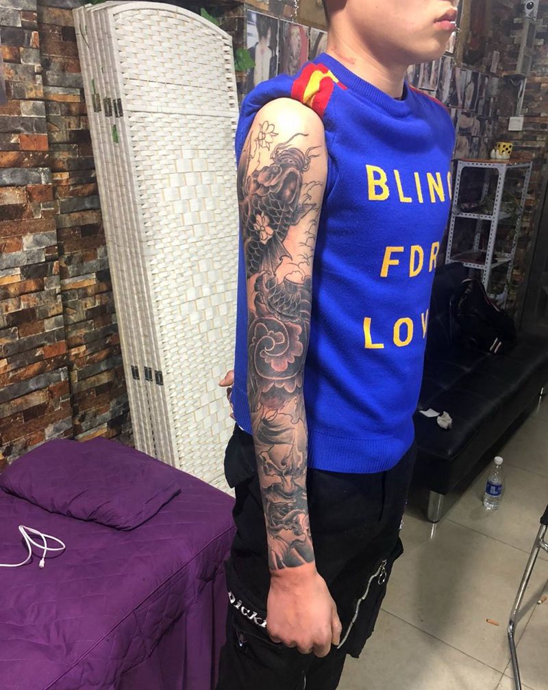 花臂未完纹身图片