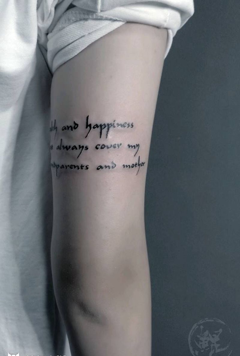 大臂纹身图片_手臂清新字符图腾原创成品纹身图案