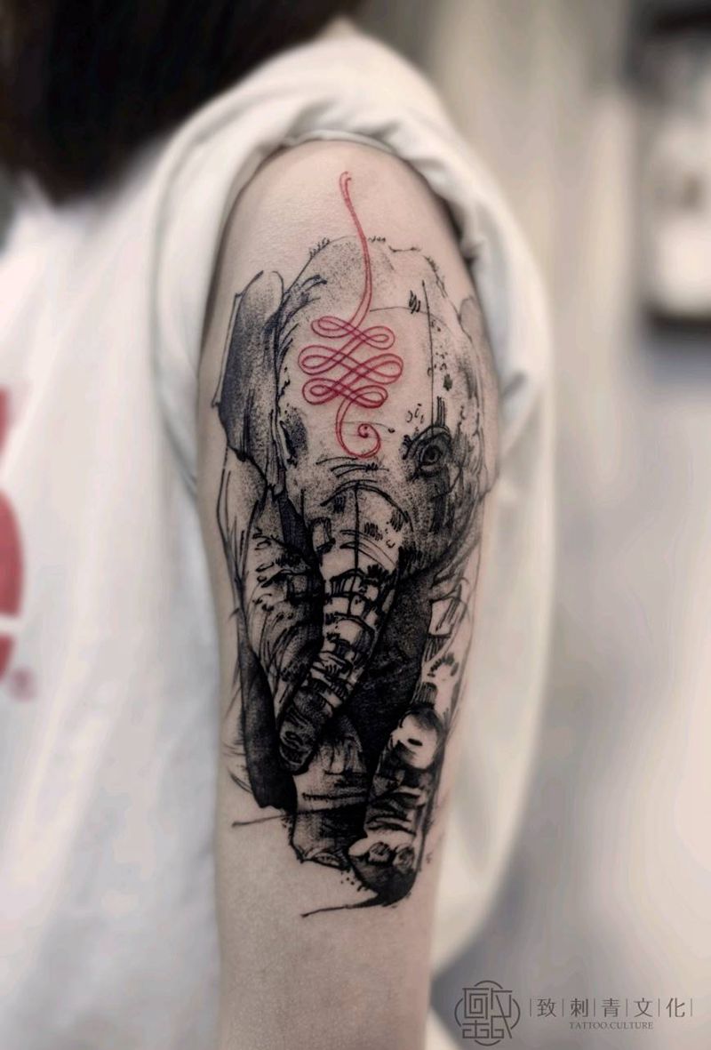象(大臂)纹身图片_手臂点刺纹身图案