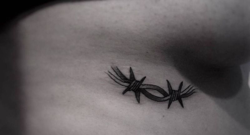 防盗铁丝网纹身图片_成品胸部腹部欧美清新国画习俗字符纹身图案