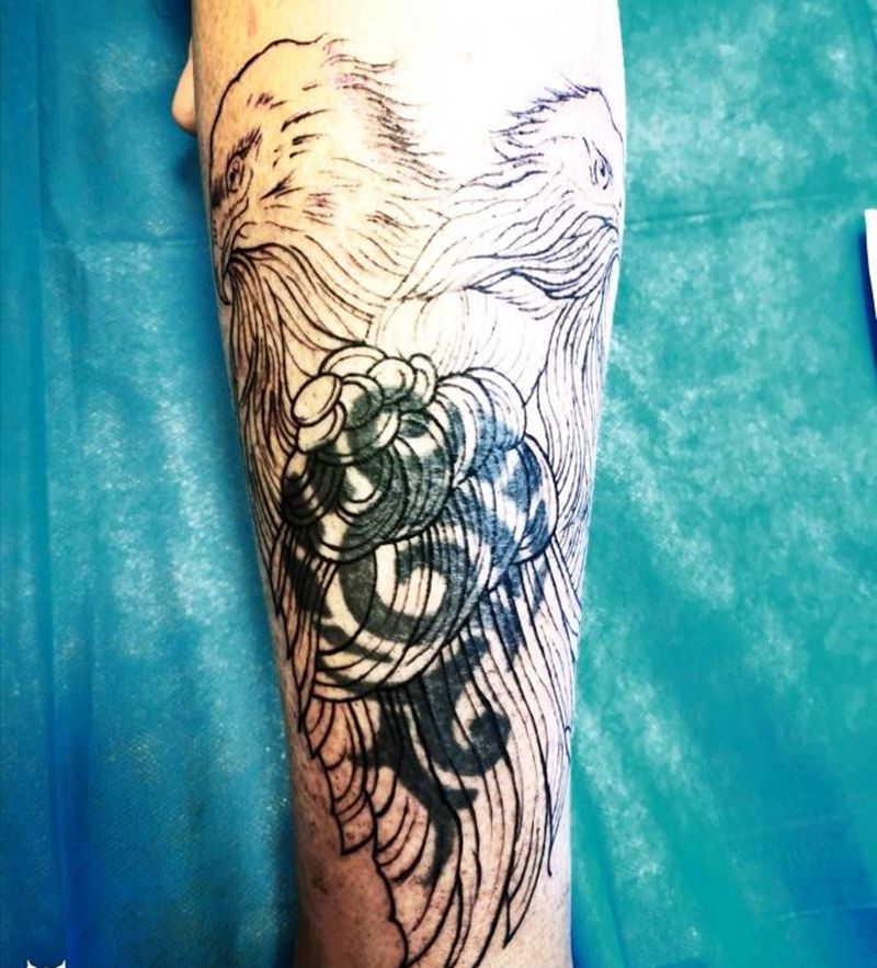 双头鹰遮盖纹身图片_腿部新传统欧美写实老鹰遮盖鹰纹身图案