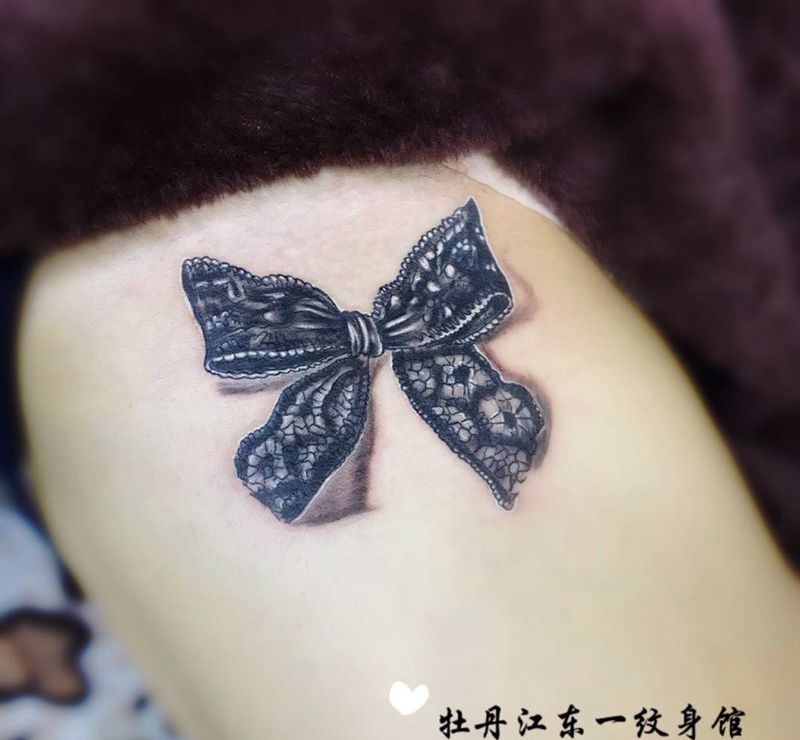 蕾丝蝴蝶结纹身图片