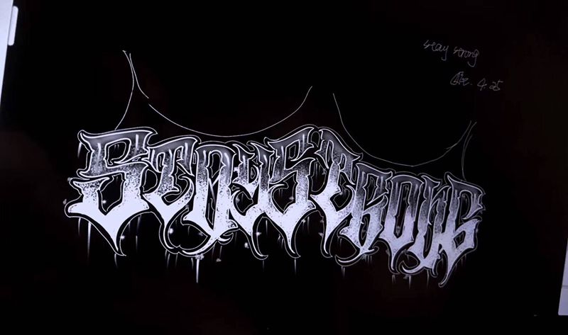 手绘花体字纹身图片_手臂花体字奇卡诺纹身图案