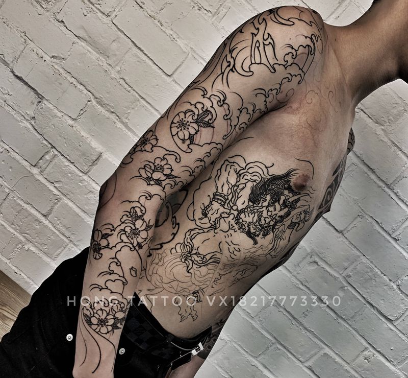 招财臂纹身图片_手臂纹身图案