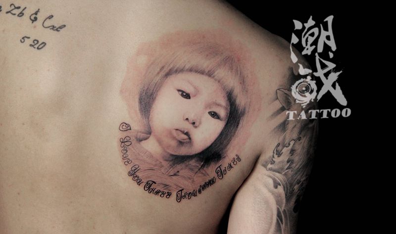 我的宝贝纹身图片_背部欧美写实肖像纹身图案