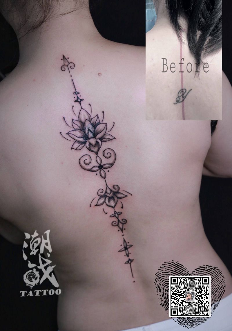 遮盖纹身图片_背部点刺几何莲花遮盖纹身图案